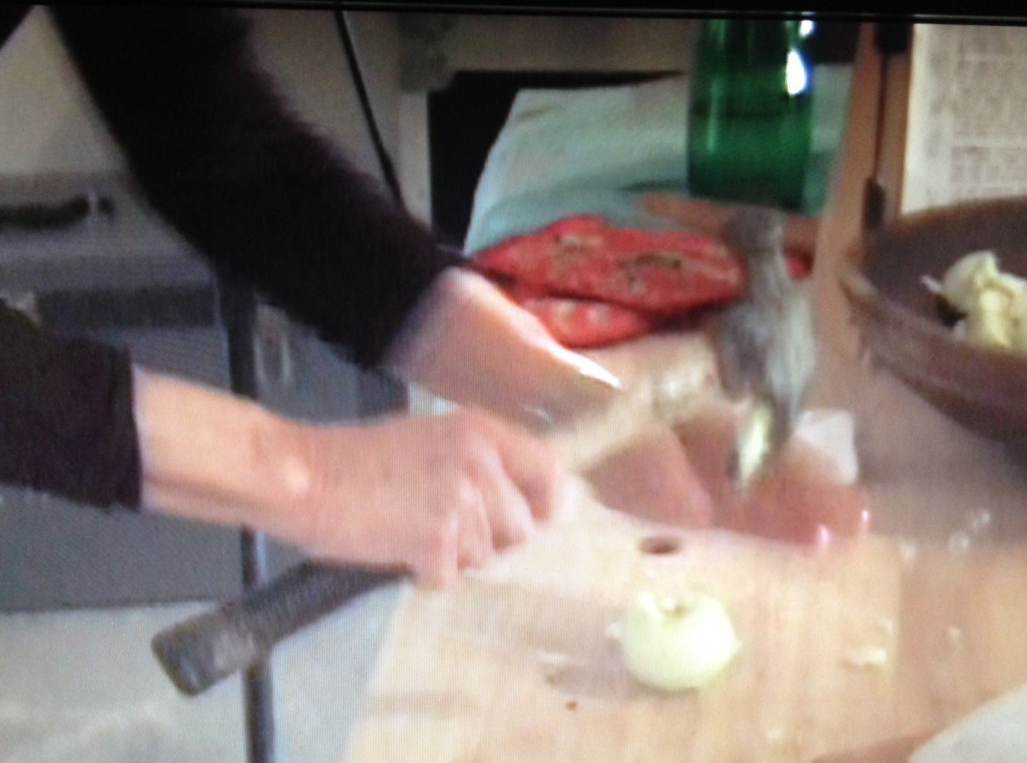 image of hands smashing items on a countertop with a hammer