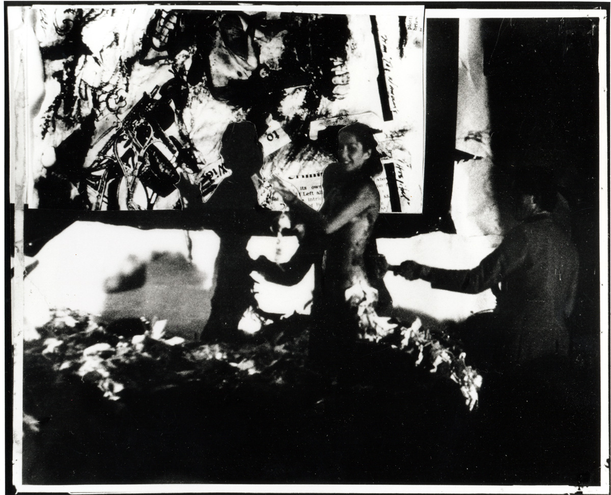 black and white image of the artist kneeling in front of a projection of a collage