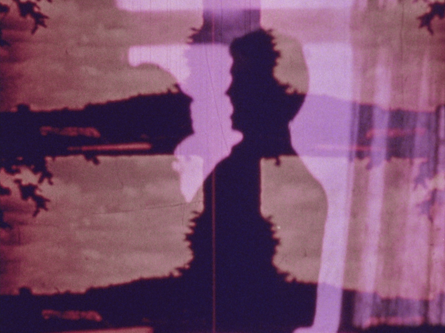 side profile of a figure, overlayed with an abstract image